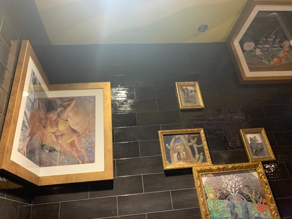 Bathroom art at Three Saints Revival. Photo courtesy of Three Saints Revival